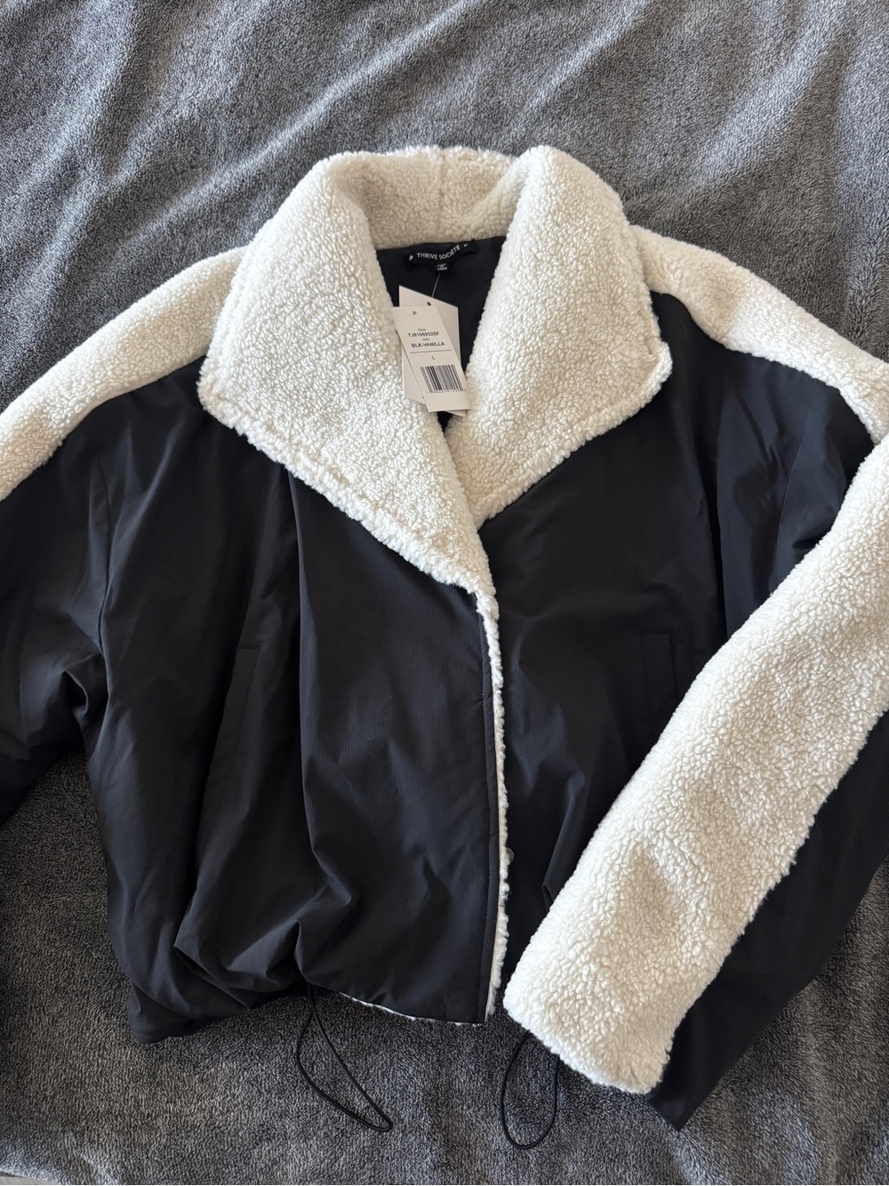 Faux-Sherpa Lined Black Cropped Jacket with Cream Trim